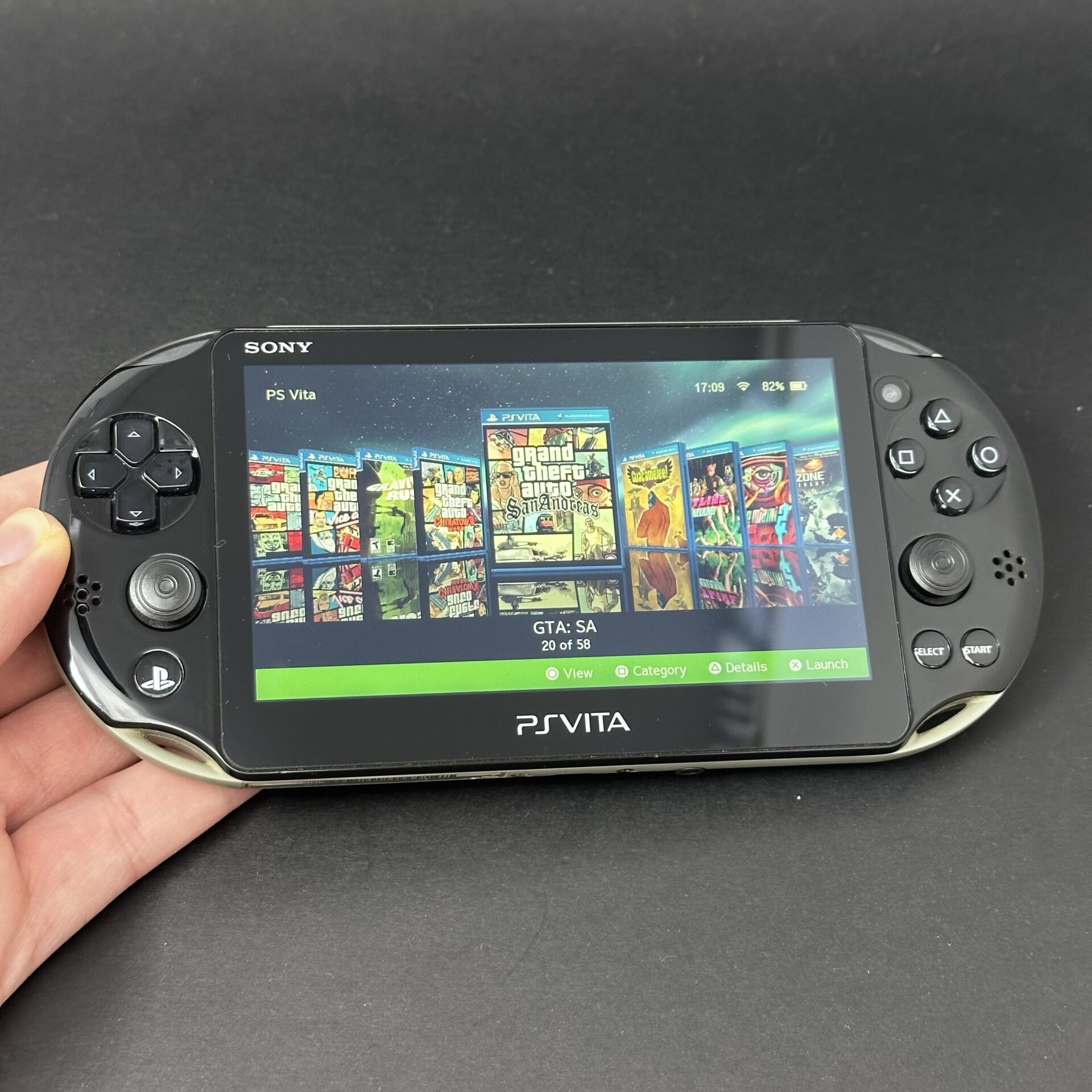 PS Vita Slim (128GB) - 580 Games | Khaki and Black
