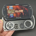 PSP GO (16GB) - 900 Pre-Loaded Games | Black w/ New Screen!
