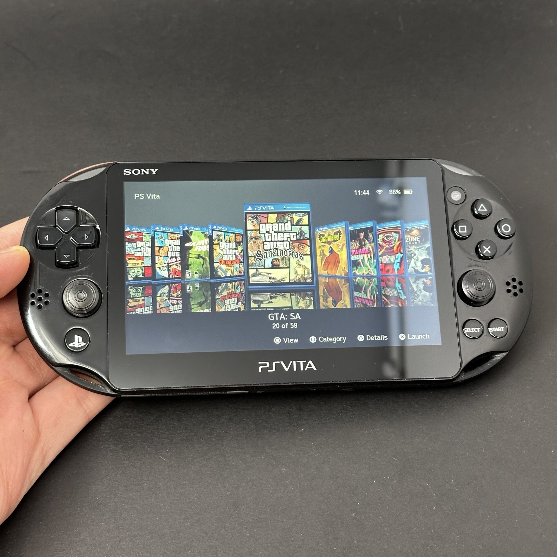 PS Vita Slim (128GB) - 580 Games | Pink and Black