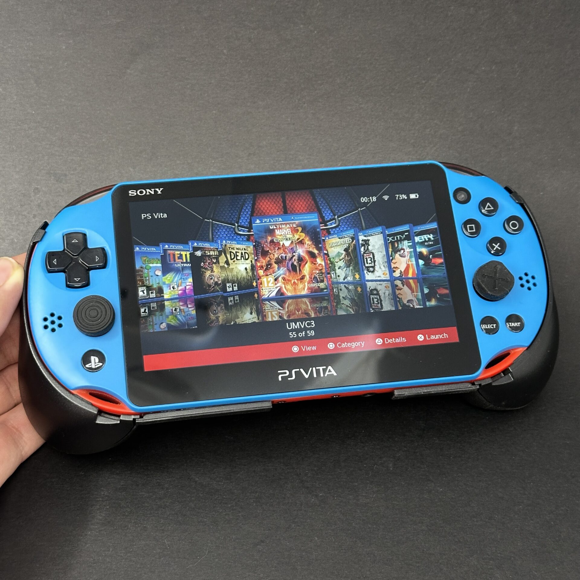 ULTIMATE PS Vita Slim (128GB) - 580 Games | Blue and Red