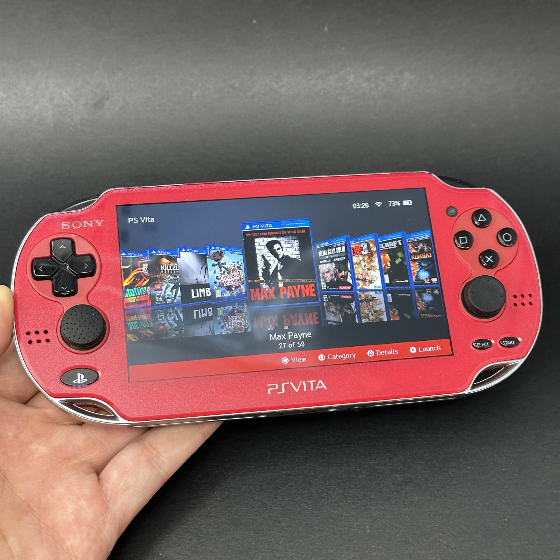 PS Vita OLED (128GB) - 580 Games | Red and Black