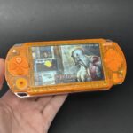 PSP 1000 (128GB) - 1050 Games |  Fire Orange w/ IPS SCREEN